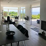 Minimalist House With Sea View At Helgenaes Ferienhaus
