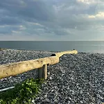 Minimalist House With Sea View At Helgenaes Ferienhaus